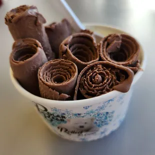 Medium dish of yummy chocolate rolls!