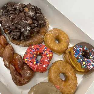 a variety of donuts in a box