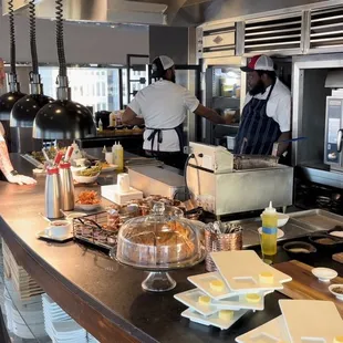 Open kitchen in the center of the restaurant