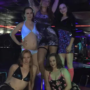 a group of women posing for a picture