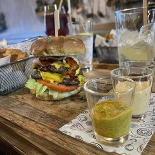 a burger and fries on a table