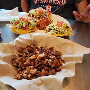 Pork skins (Chicharrones) and in the background are the tostadas.