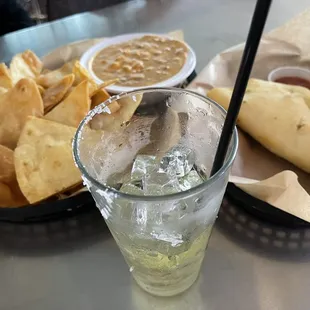 homemade white fried chips w bean and cheese dip, white taco with chicken