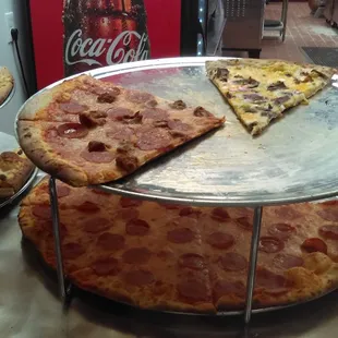 Sausage and Pepperoni (on top); Pepperoni on bottom.