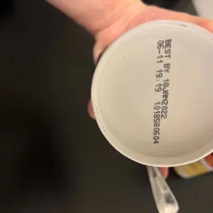 a person holding a cup