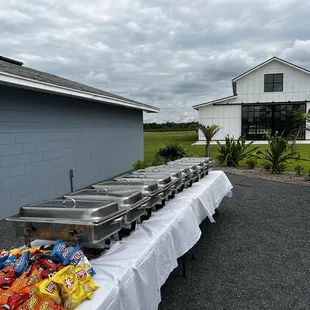 a buffet table with a variety of food items