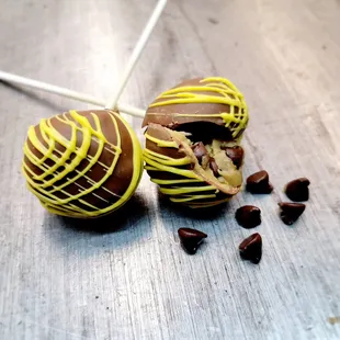 two chocolate covered candies