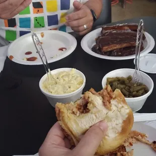 Chopped turkey sandwich, ribs potato salad, green beans, red link sausage