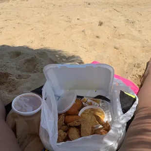 a woman&apos;s legs on the beach