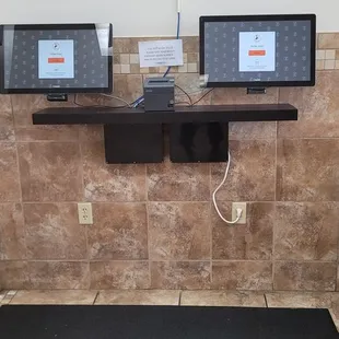 two computers on a counter