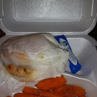 a meal in a styrofoam container