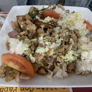 #10 Pollo Saltado (chicken, fries, onion, Peruvian red chili over rice).