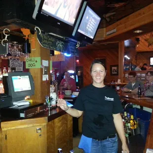 a man standing at a bar