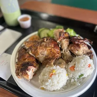 Half chicken, rice and salad