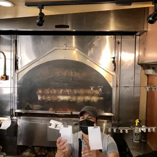 a man working in a commercial kitchen