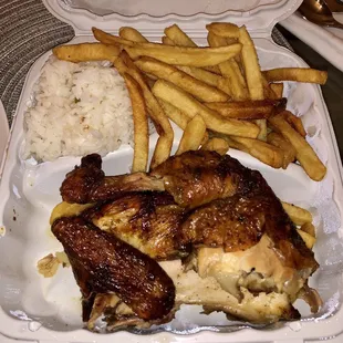 Half chicken with fries and rice