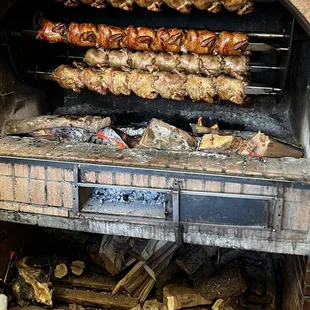 a brick oven filled with food