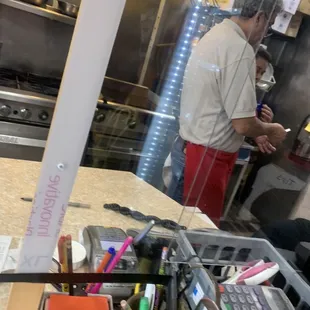 a man working in a kitchen