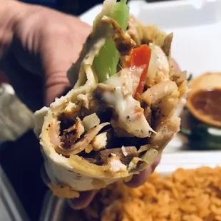 Chicken burrito/best one I have EVER had &amp; it's YUGE! The chicken is most &amp; flavorful &amp; the Oaxaca cheese just made it! GET IT!! :)...