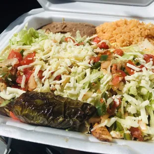 LOVE the chicken tacos! 3 chicken tacos with lettuce tomato cheese rice &amp; beans YUM! :)..