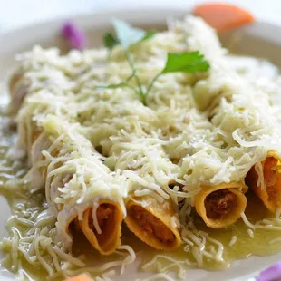 Green enchiladas, once you try them you will came back for more.