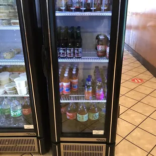 Plenty of juice and soda variety in numerous coolers.