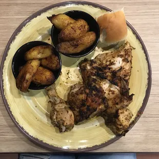 Half Chicken Special, all white meat with x2 orders of fried plantains and a dinner roll