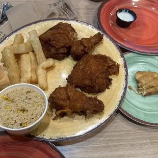 4 piece chicken meal with rice and yuca fries Chicken empanada