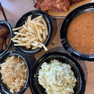 sides - fries, plantains, coleslaw, rice beans