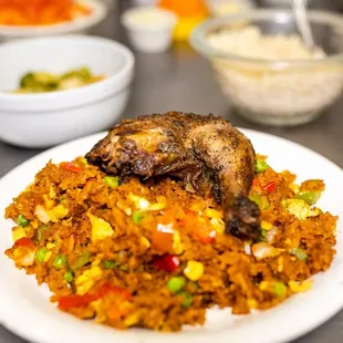 a plate of fried rice with meat and vegetables
