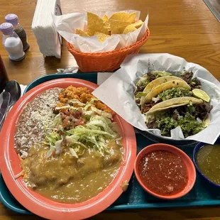 Crispy Chile Rellenos covered in green chile, rice and beans plate. (2) Carne Asada tacos (1) Chorizo taco, chips and salsa &amp; a Dr. Pepper