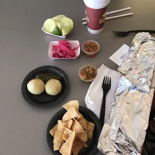 Cucumbers w lime, red salsa, grilled jalapeño, onions, tortillas, and chips!