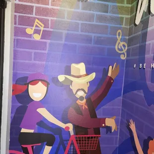 a man riding a bike and a woman riding a bicycle