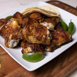 a plate of chicken wings