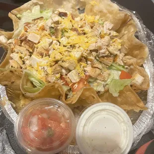 Chicken tostada salad good size and delicious and nice price , it would be even better if they  had the avocado sauce