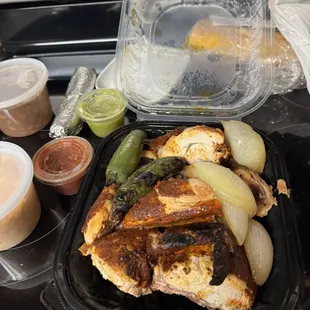 Whole chicken, rice, and beans.