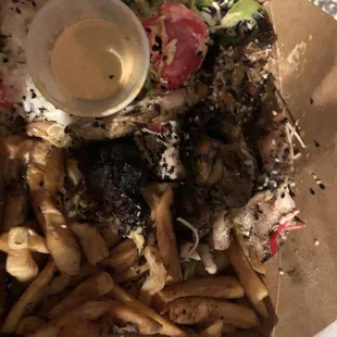 Paid $19 for half chicken and got a bunch of fries, dried rice and slices of thighs and salad. Garbage!