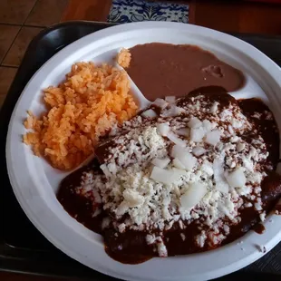 Chicken enchiladas in mole sauce