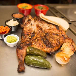 a large piece of meat on a grill