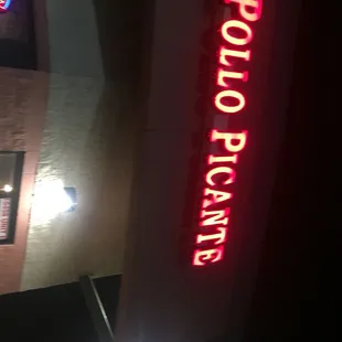 a neon sign for a restaurant