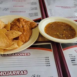 Complementary chips and beans with salsa