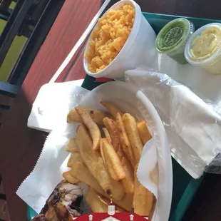 1/4 White meat chicken with fries and yellow rice. Nice staff and clean establishment.