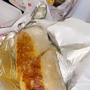 Stuffed burrito and steak fries