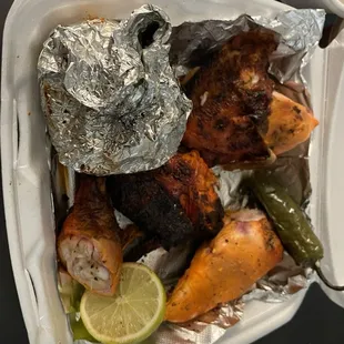 Half chicken. $12.49