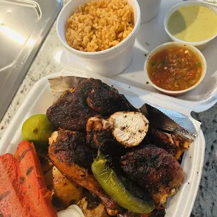 Pollo Asado, sausage, onions and jalapeños.  Sides: Rice, borracho beans and salsas.