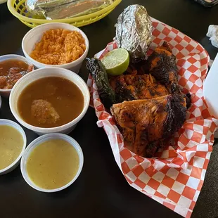 1/2 pollo asado, rice, beans, grilled onion, corn tortillas, limonada.