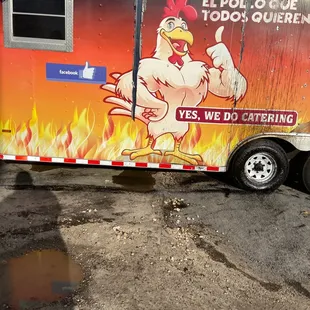 a chicken on a trailer