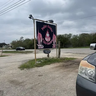 a sign in a parking lot