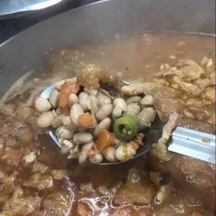 a spoon full of soup