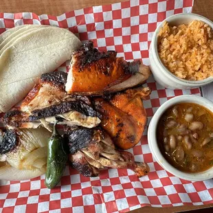 Half Chicken with rice &amp; beans.